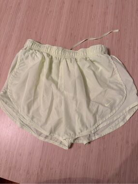 Nike Women's Pale Yellow dri-fit Running Shorts